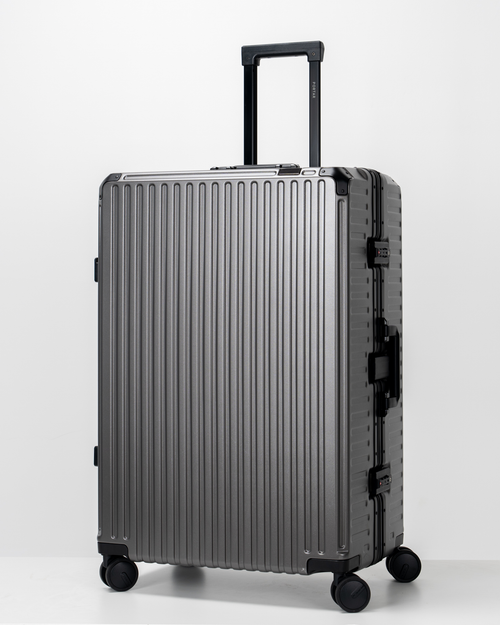 Valence Dark Gull Gray Polycarbonate Shell with Aluminum EdgeFrame Check-In Suitcase Perspective with Handle View by Portar