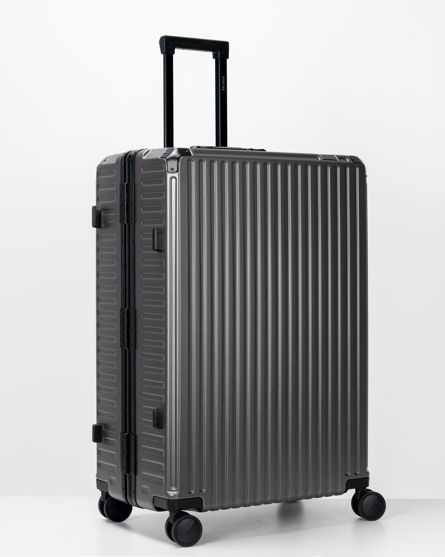 Valence Dark Gull Gray Polycarbonate Shell with Aluminum EdgeFrame Check-In Suitcase Side Angle View by Portar