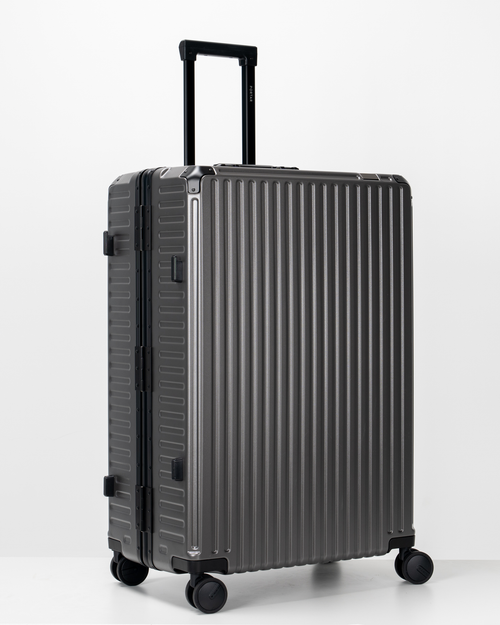 Valence Dark Gull Gray Polycarbonate Shell with Aluminum EdgeFrame Check-In Suitcase Side Angle View by Portar