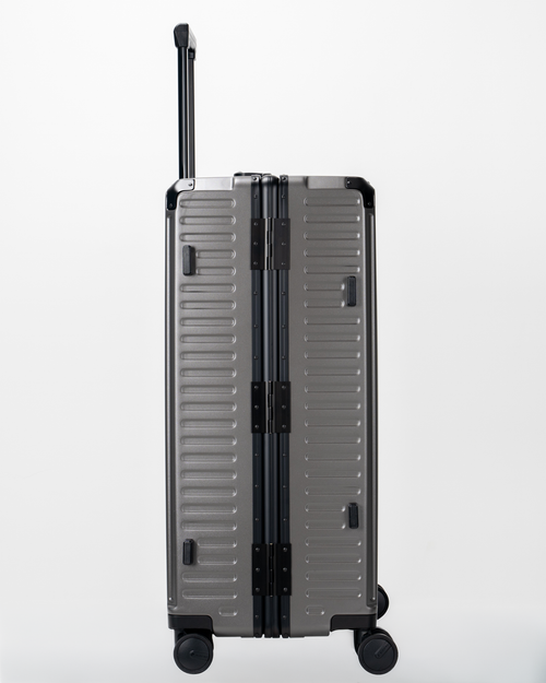 Valence Dark Gull Gray Polycarbonate Shell with Aluminum EdgeFrame Check-In Suitcase Side View by Portar