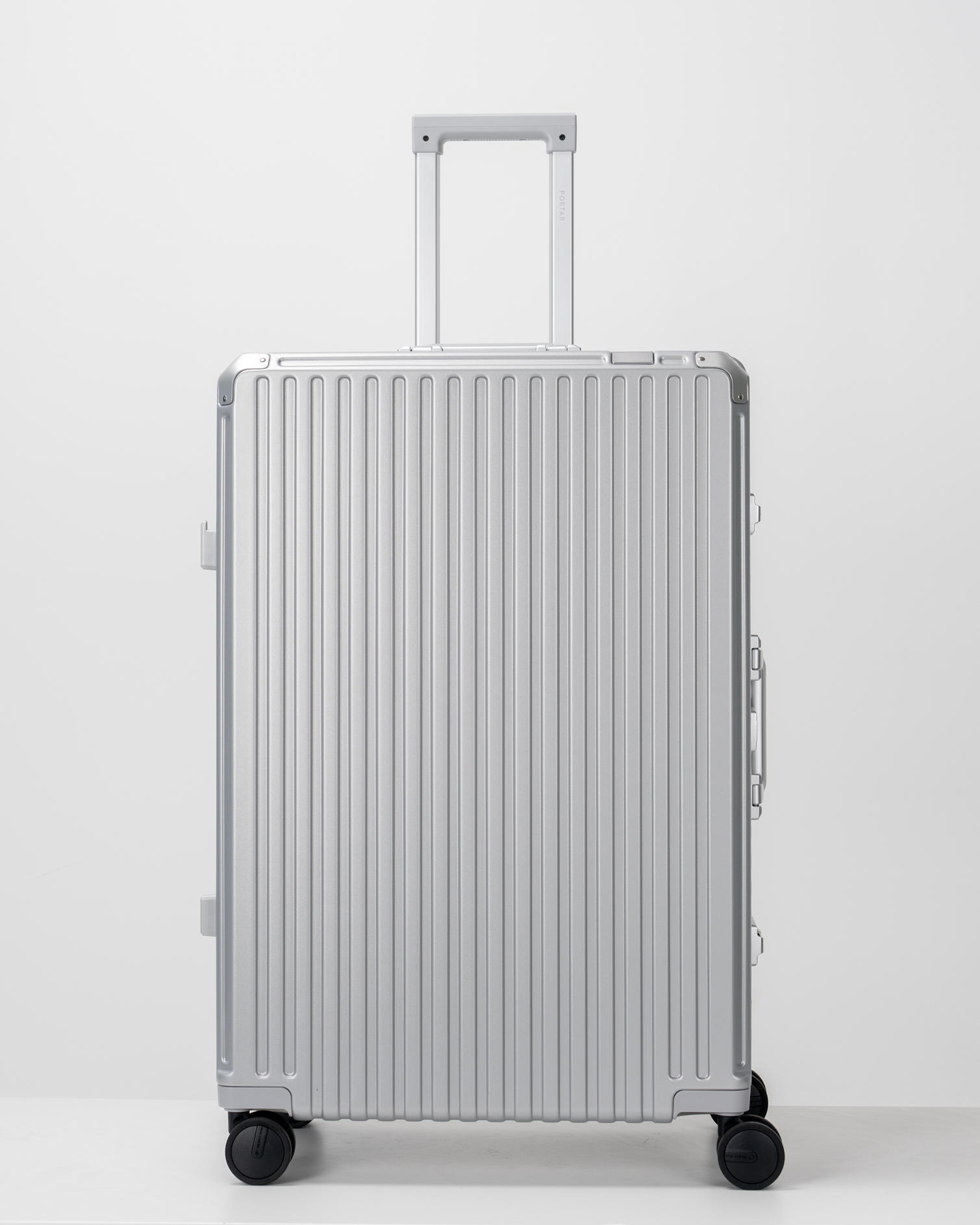 Valence Lunar Silver Polycarbonate Shell with Aluminum EdgeFrame Check-In Suitcase Front with Handle View by Portar