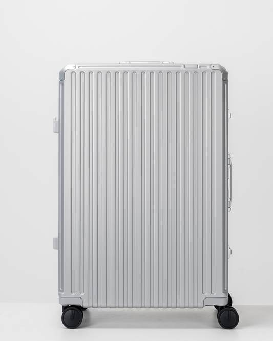 Valence Lunar Silver Polycarbonate Shell with Aluminum EdgeFrame Check-In Suitcase Front View by Portar
